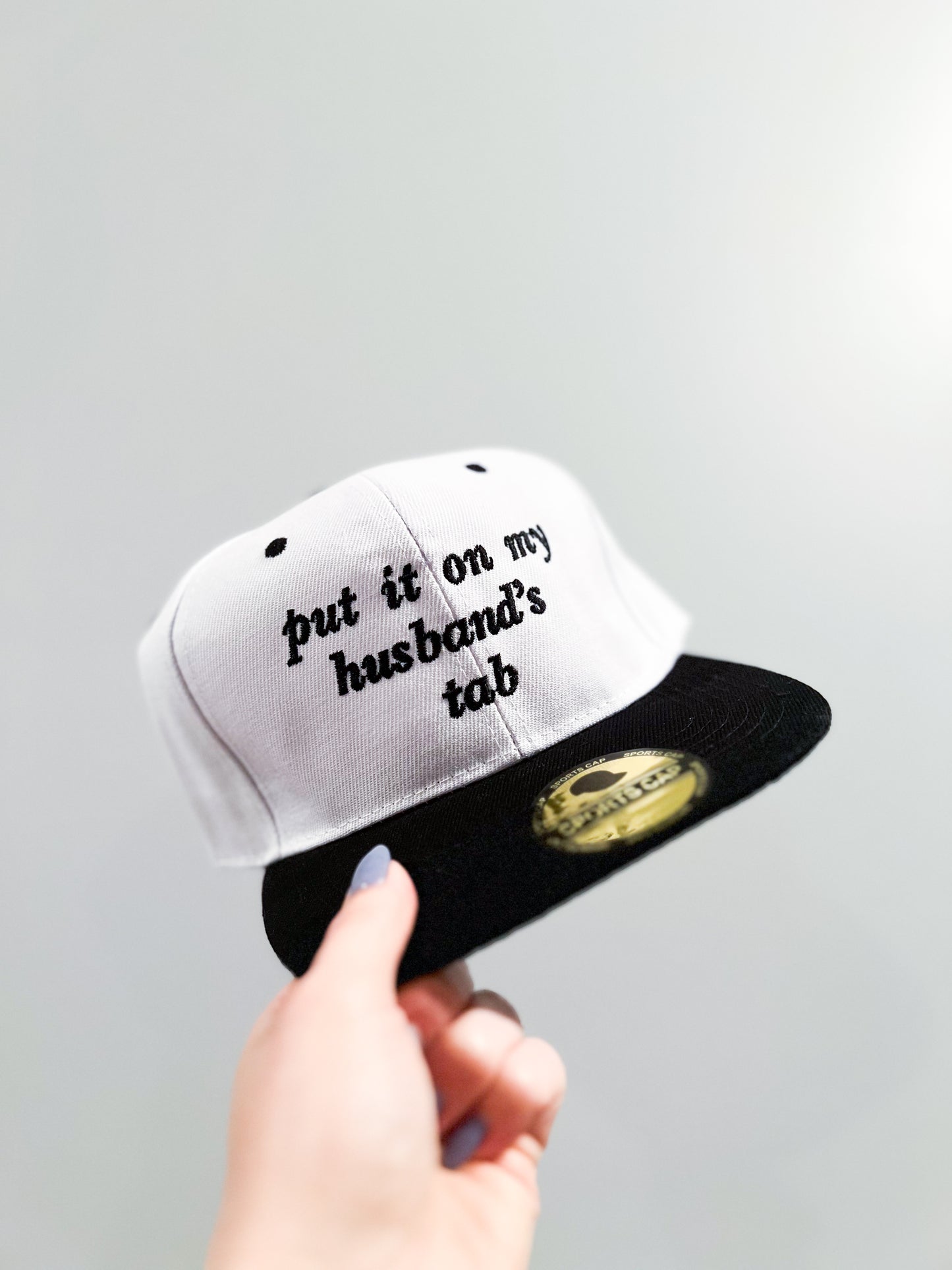 Put it on my husbands tab hat
