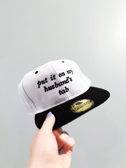 Put it on my husbands tab hat
